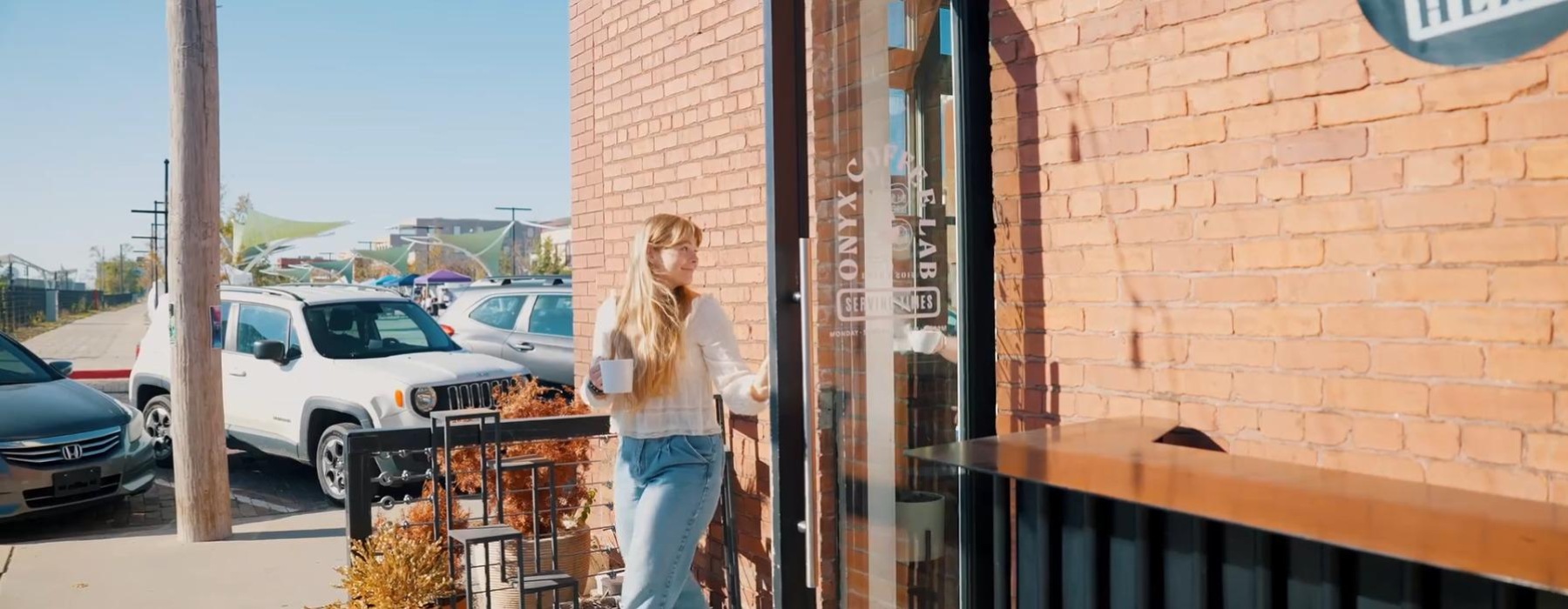 Woman walking out of a store 