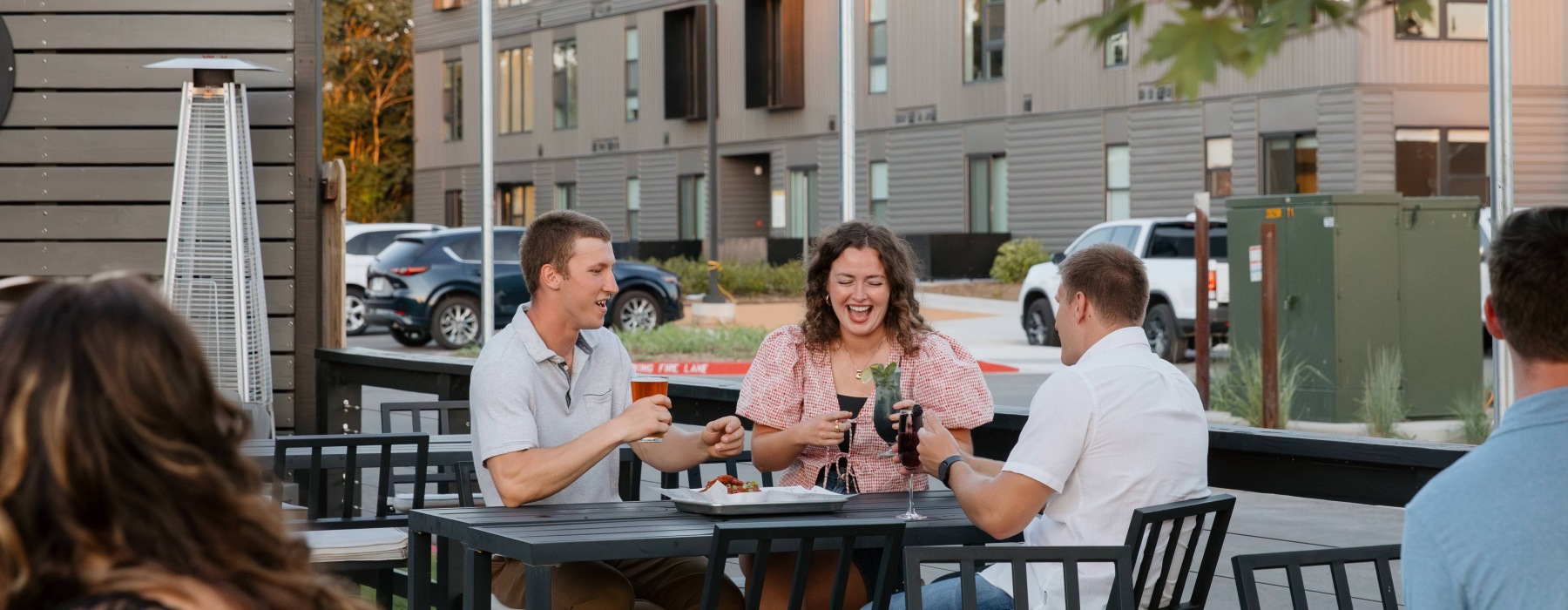 friends laughing on patio